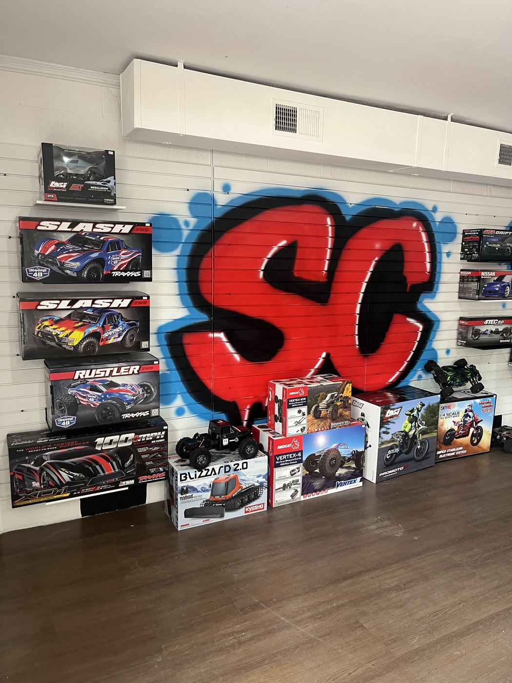 SC graffiti mural and Traxxas RC trucks at SC2NY RC Shop in Rock Hill, SC