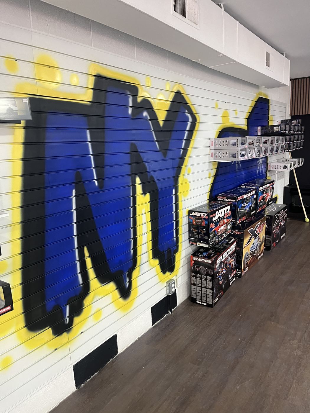 NY graffiti mural wall inside SC2NY RC Shop